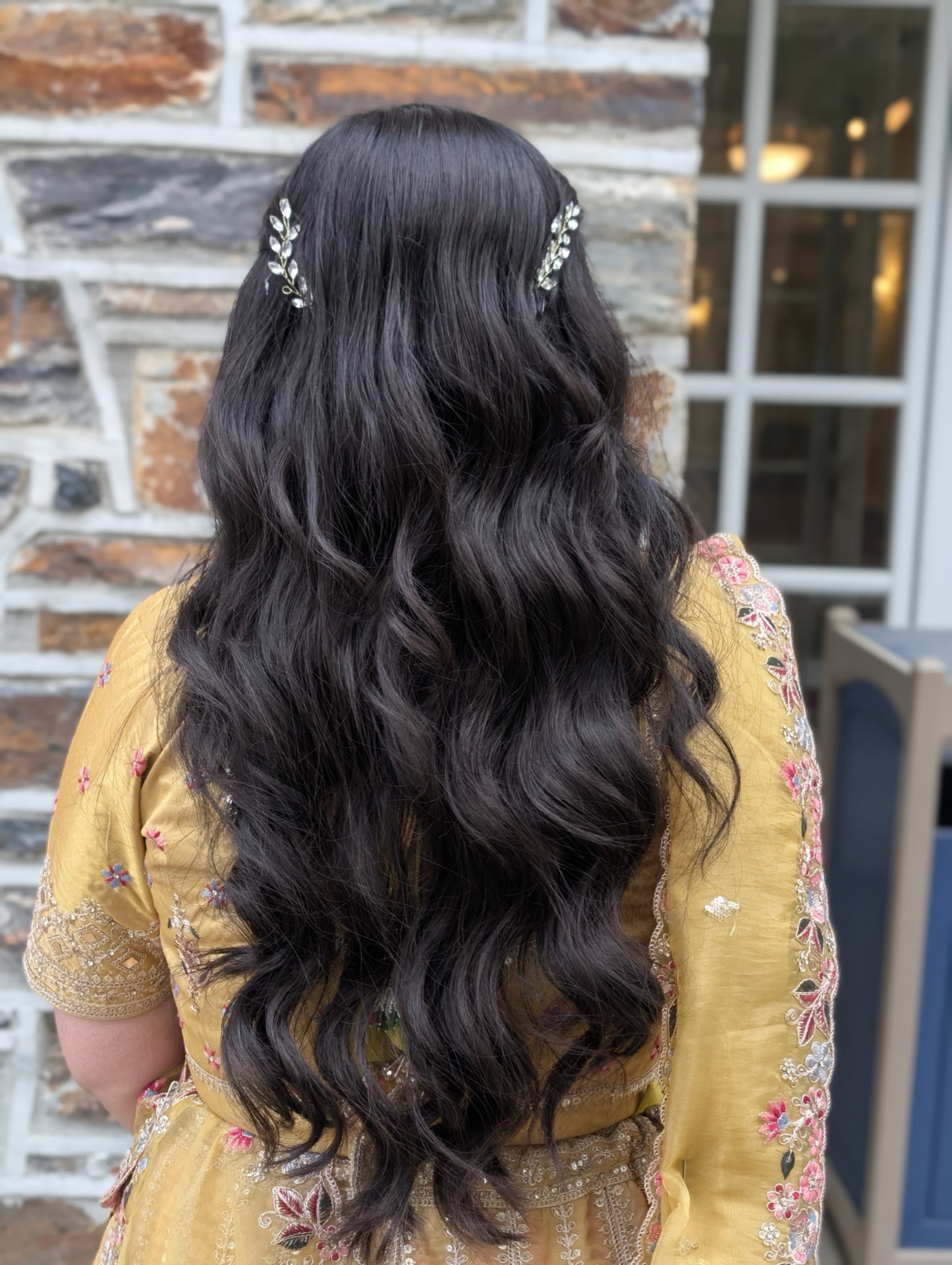 Hollywood waves open hairstyle with crystal hair pins for mehndi ceremony by CurlyRootsByRitu