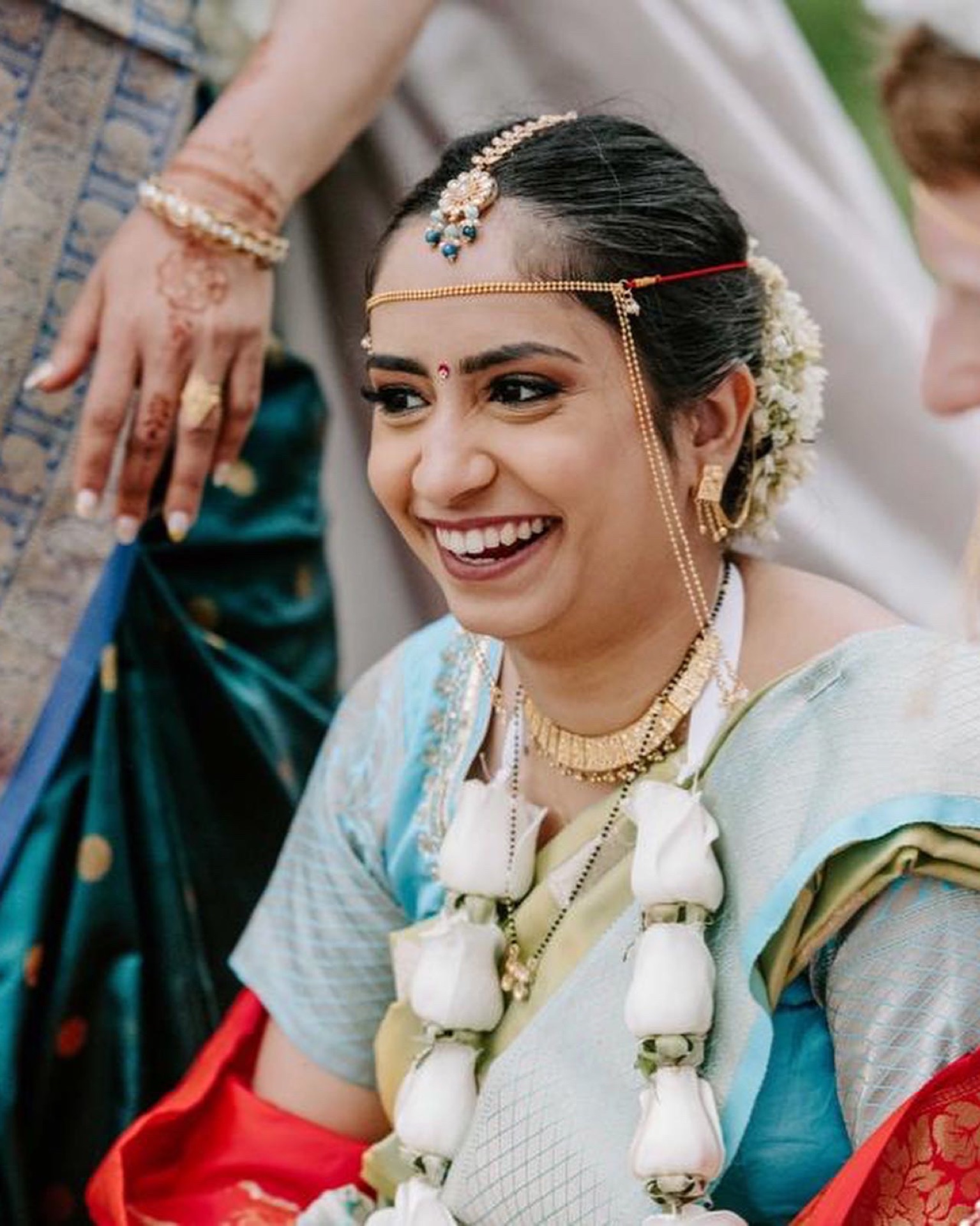 Bengali saree draping style for wedding ceremony by CurlyRootsByRitu